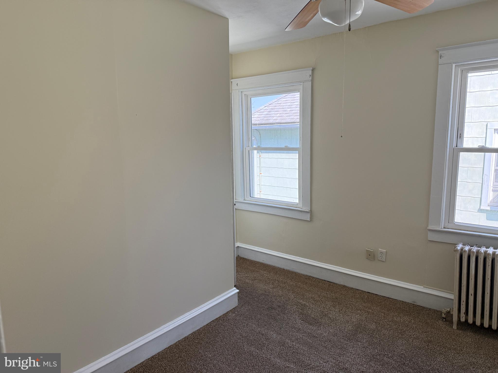 4049 Marshall Road Upper Darby, PA 19026 - Photo 17 of 26 an empty room with windows