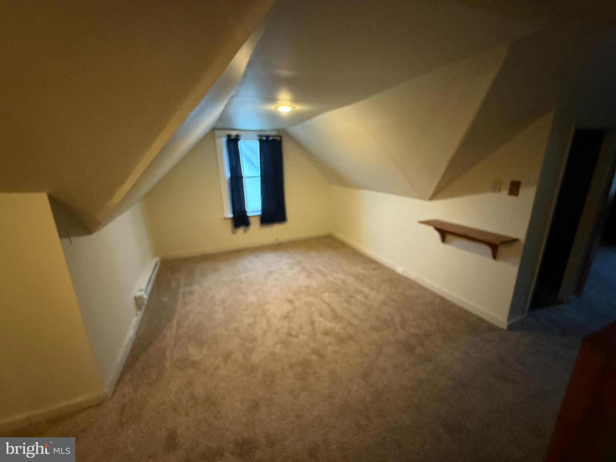 4049 Marshall Road Upper Darby, PA 19026 - Photo 21 of 26 a view of an empty room with wooden floor