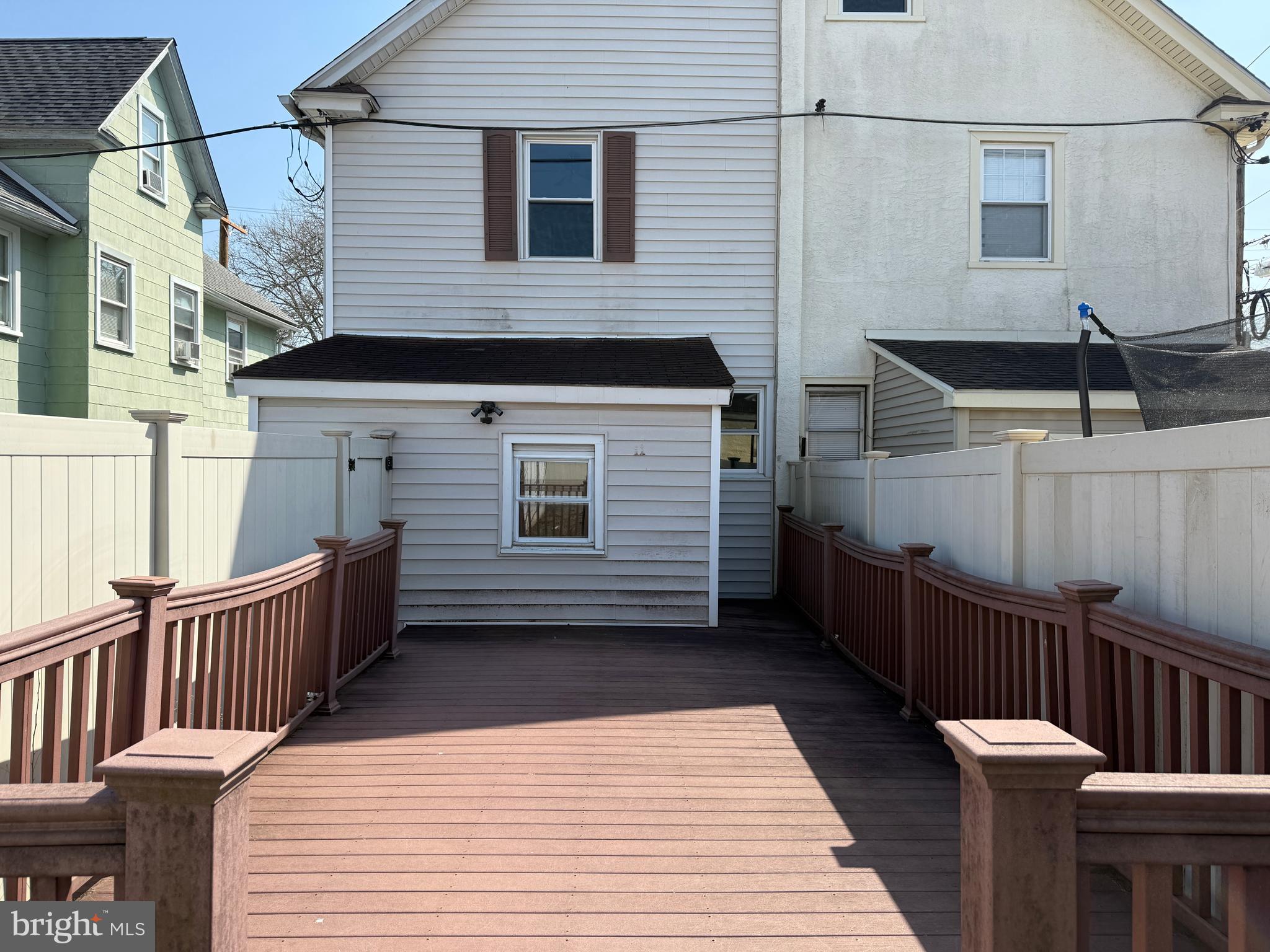 4049 Marshall Road Upper Darby, PA 19026 - Photo 26 of 26 a view of a deck with wooden floor and fence