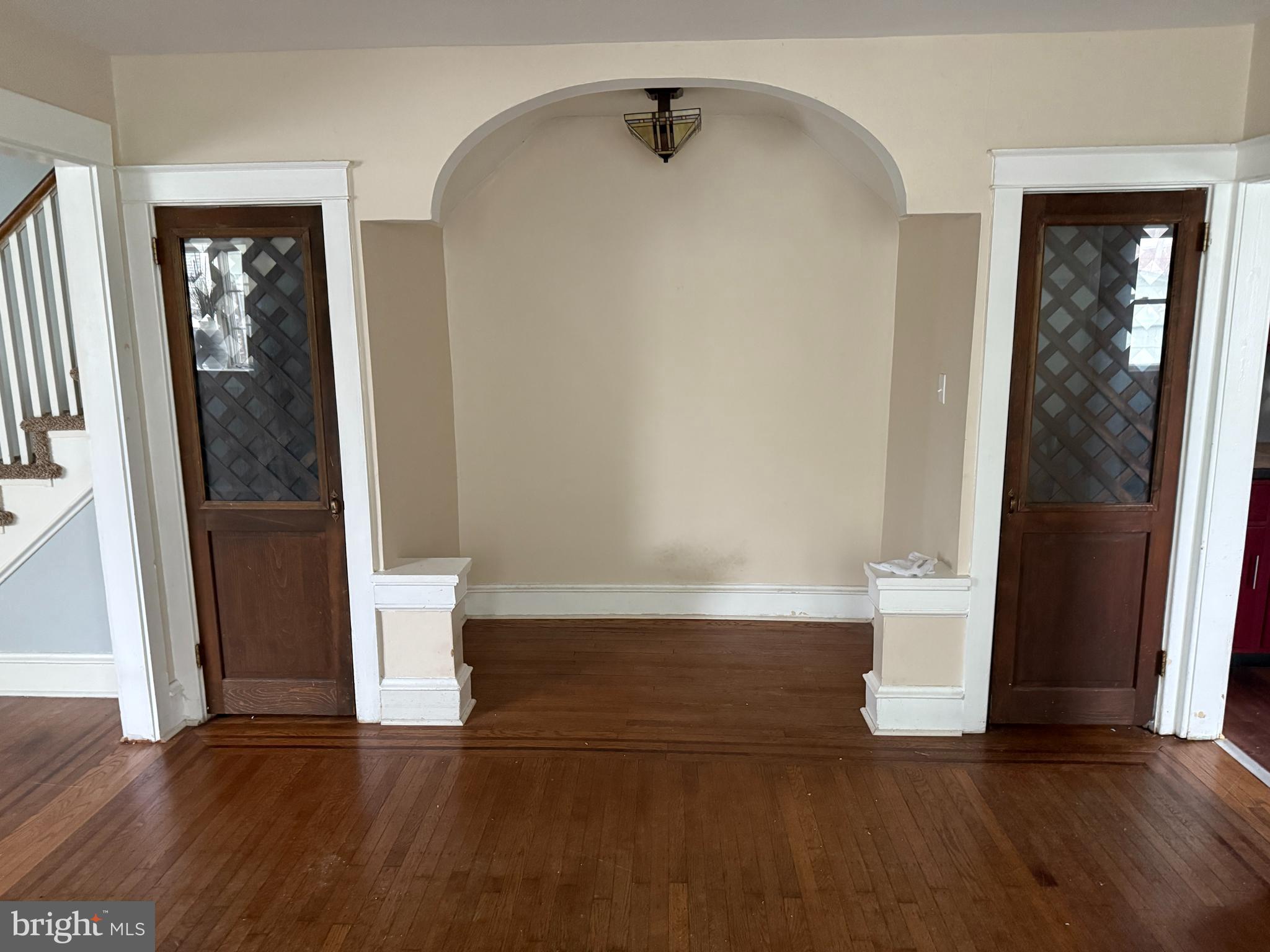4049 Marshall Road Upper Darby, PA 19026 - Photo 8 of 26 wooden floor in an empty room with a window