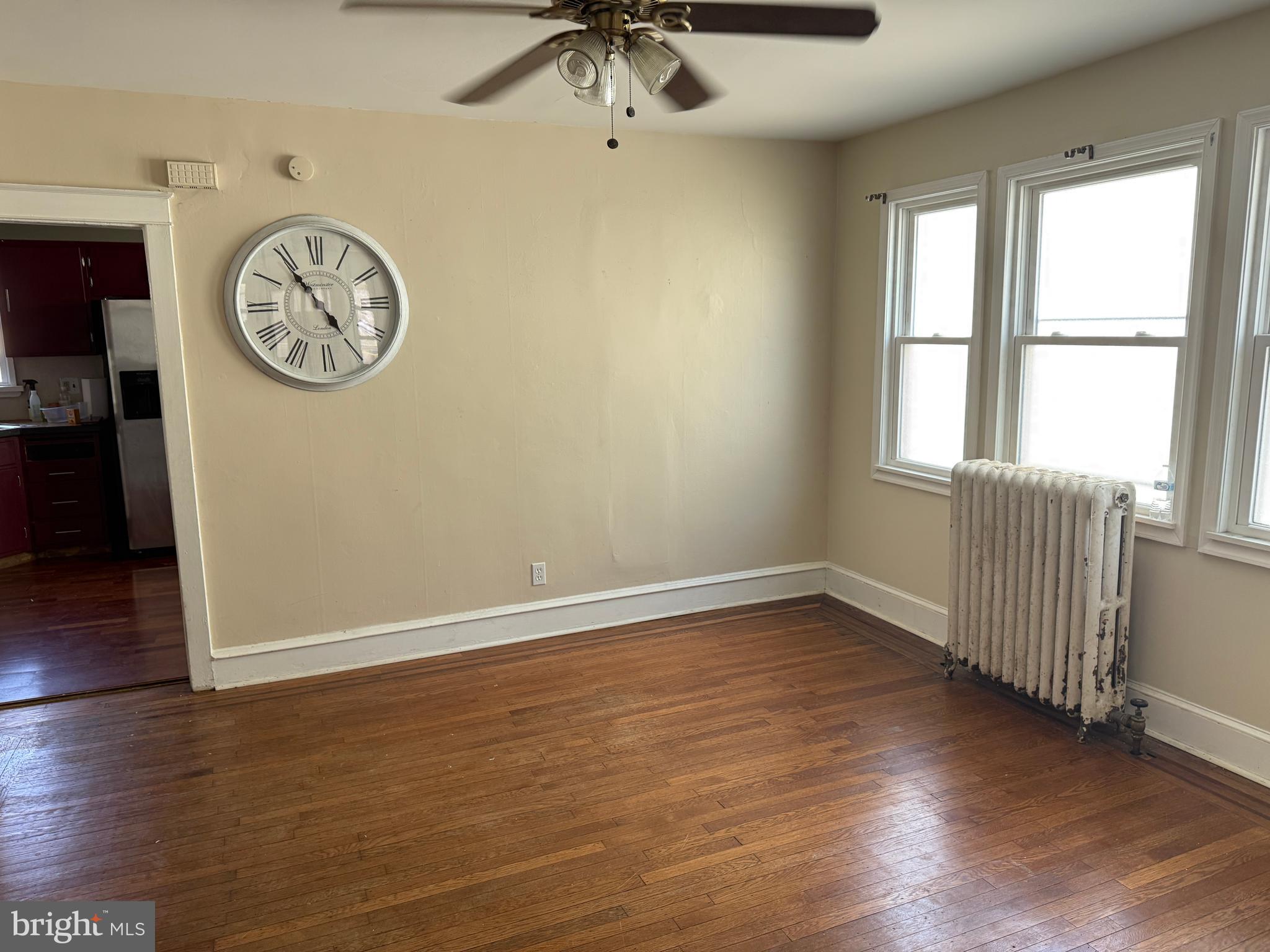 4049 Marshall Road Upper Darby, PA 19026 - Photo 9 of 26 a view of a hallway with a large window with wooden floor