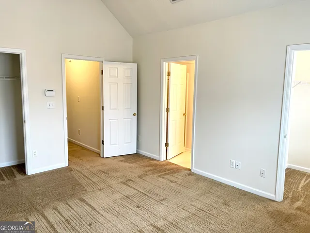 a view of walk in closet with window