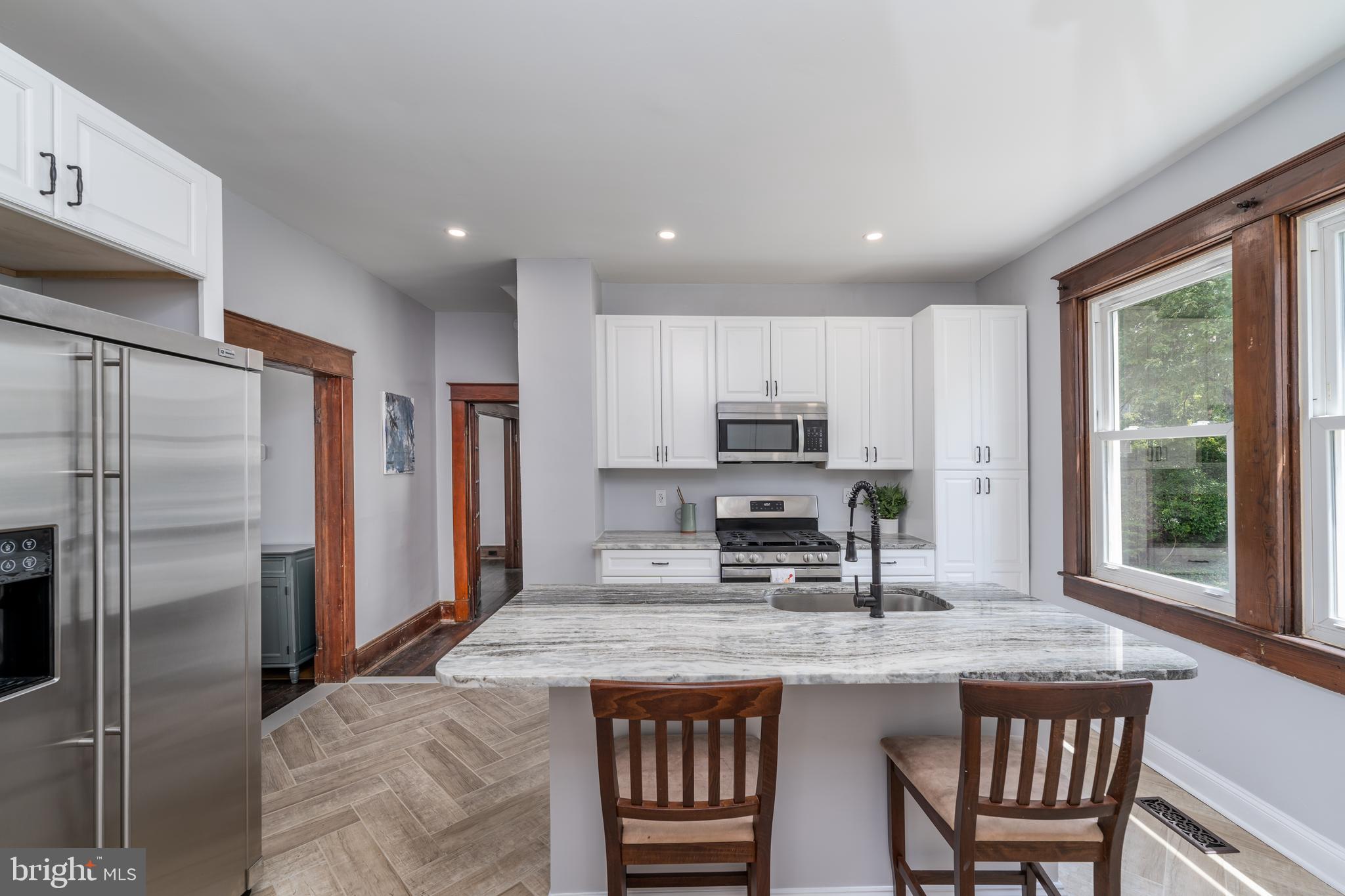 4603 White Avenue Baltimore, MD 21206 - Photo 12 of 39 Stainless steel, granite, and gas range