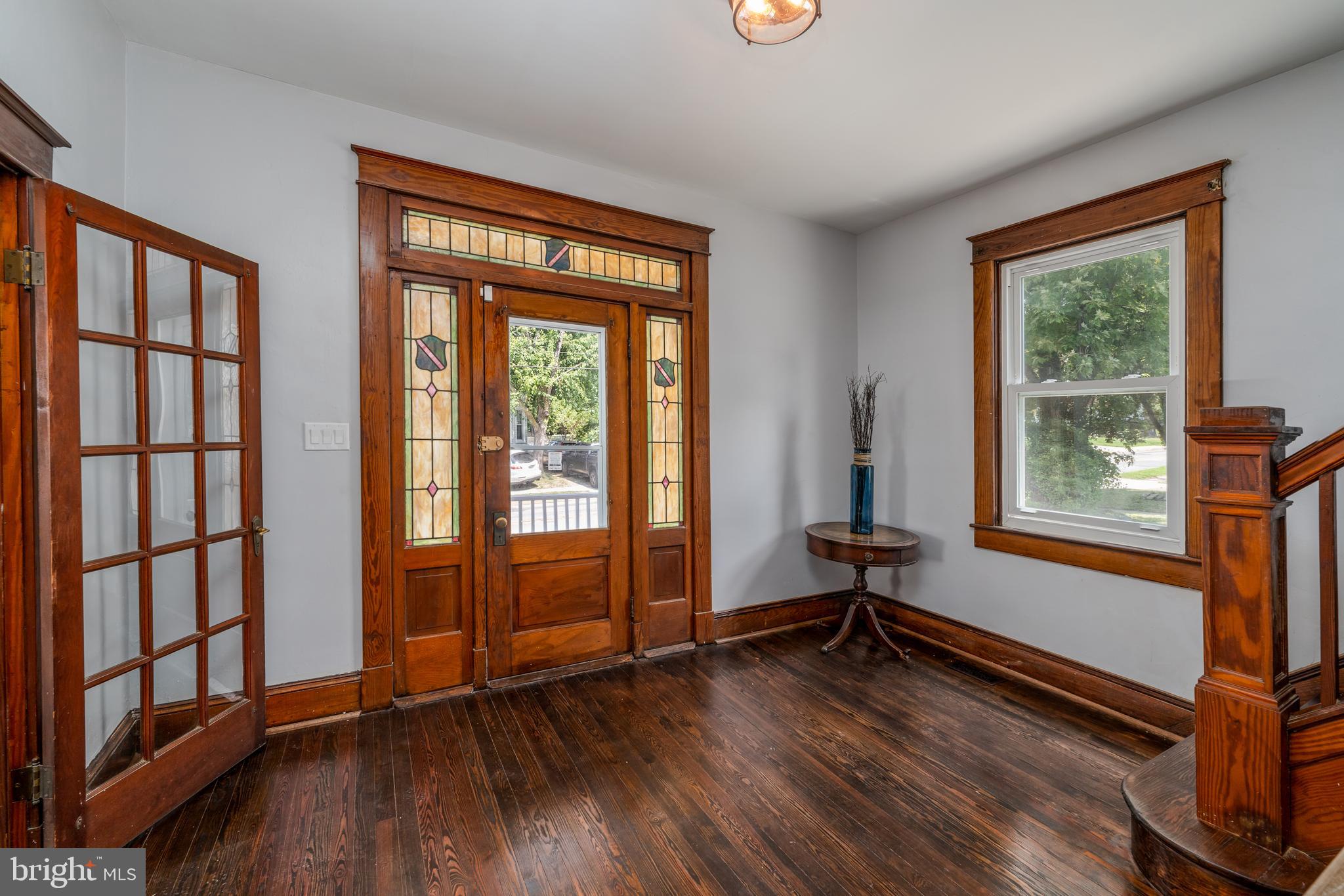 4603 White Avenue Baltimore, MD 21206 - Photo 3 of 39 Large foyer with original stained glass