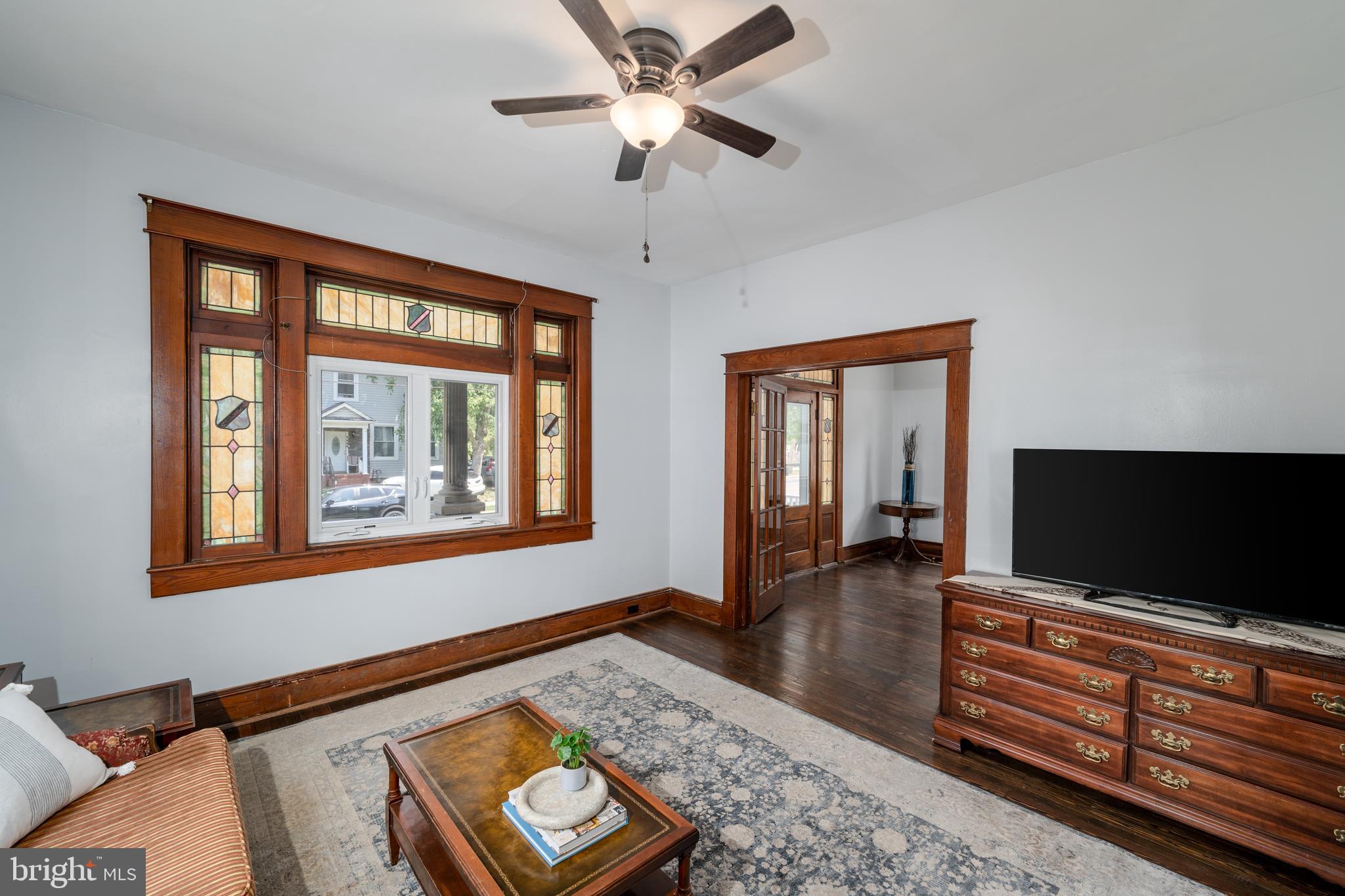 4603 White Avenue Baltimore, MD 21206 - Photo 8 of 39 Original stained glass in foyer and living room