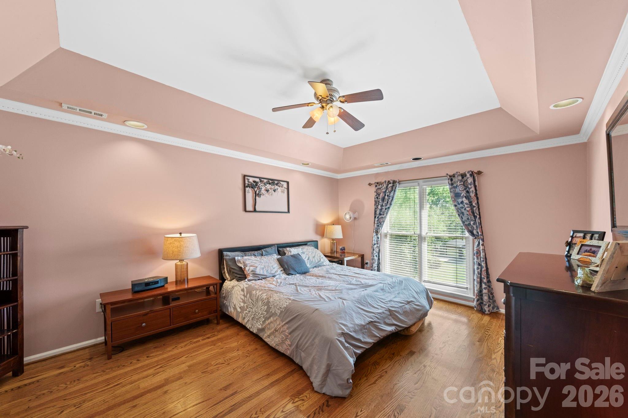 1265 Braeburn Road Northwest Concord, NC 28027 - Photo 23 of 48 a bedroom with a bed and a window
