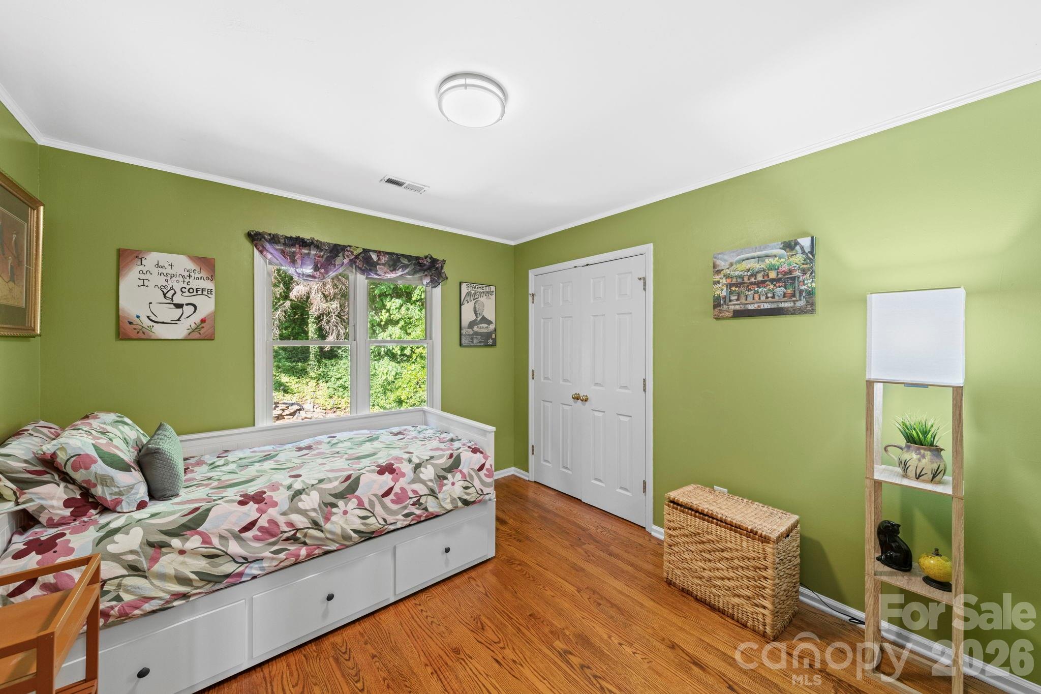 1265 Braeburn Road Northwest Concord, NC 28027 - Photo 32 of 48 a bedroom with a bed and a window