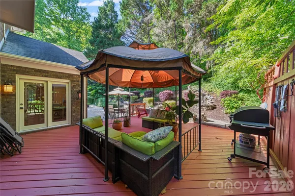a patio with table and chairs