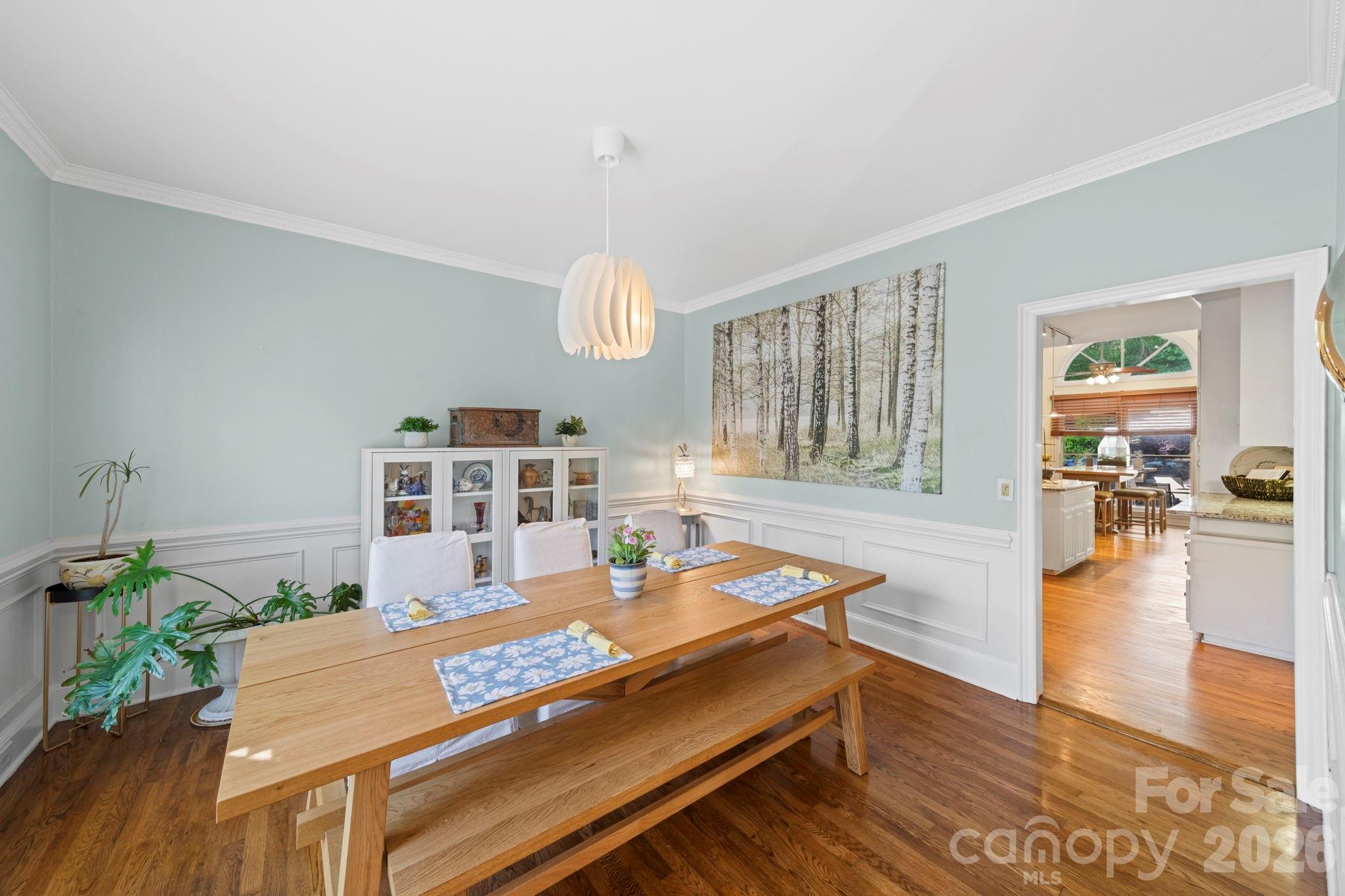1265 Braeburn Road Northwest Concord, NC 28027 - Photo 6 of 48 a living room with furniture and wooden floor