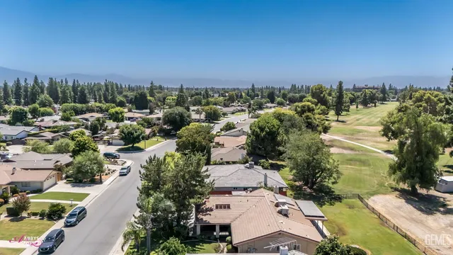 a view of a house with swimming pool