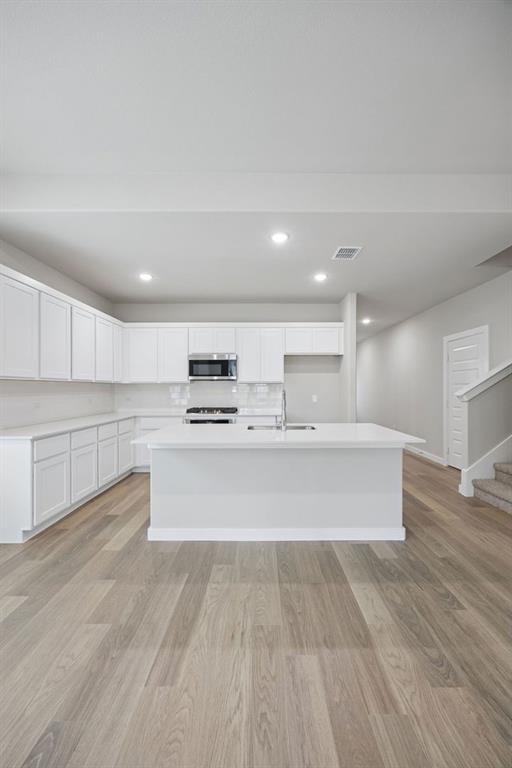 2109 Sunshining Road Princeton, TX 75407 - Photo 10 of 35 Kitchen in the Stanley II home plan by Trophy Signature Homes – REPRESENTATIVE PHOTO