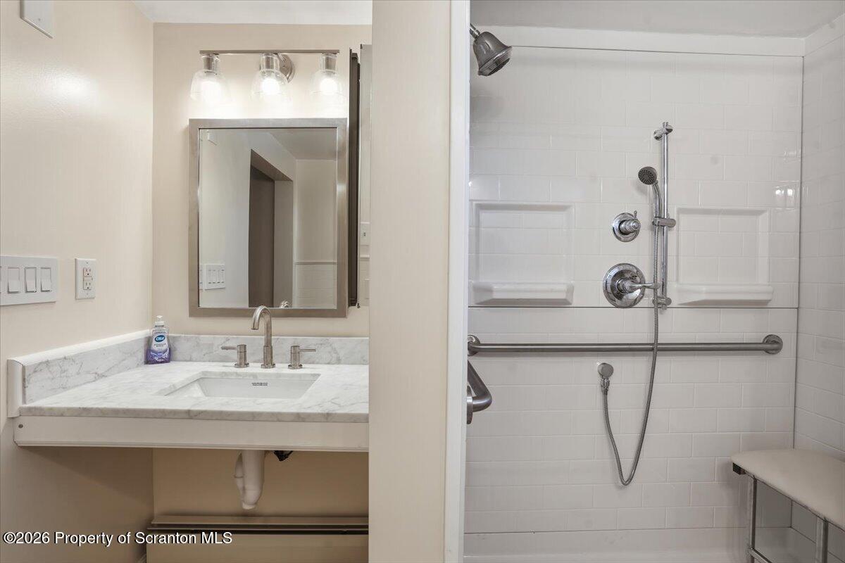 101 Stone Street Moosic, PA 18507 - Photo 17 of 53 a bathroom with a sink and a mirror