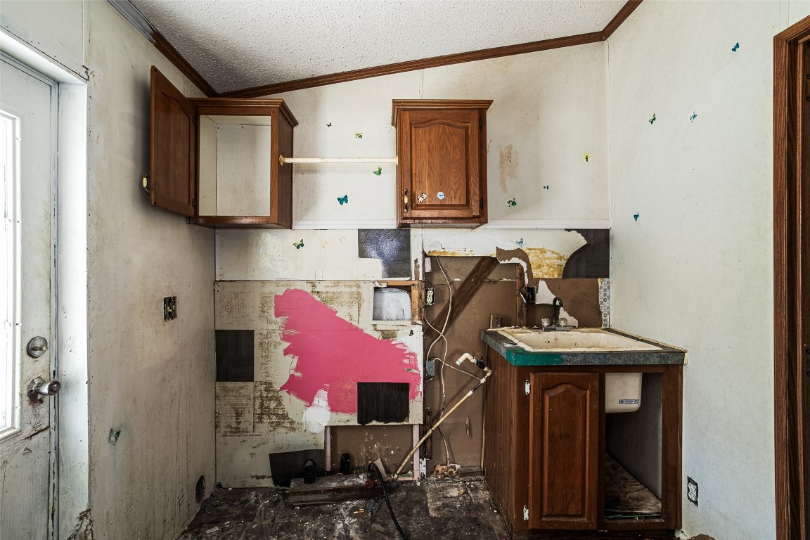 18044 Geranium Lane Hilliard, FL 32046 - Photo 11 of 15 a utility room with dryer and washer