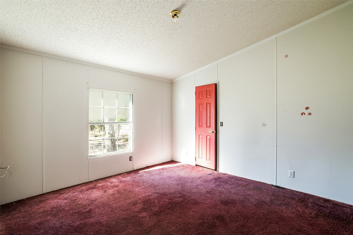 18044 Geranium Lane Hilliard, FL 32046 - Photo 13 of 15 an empty room with windows