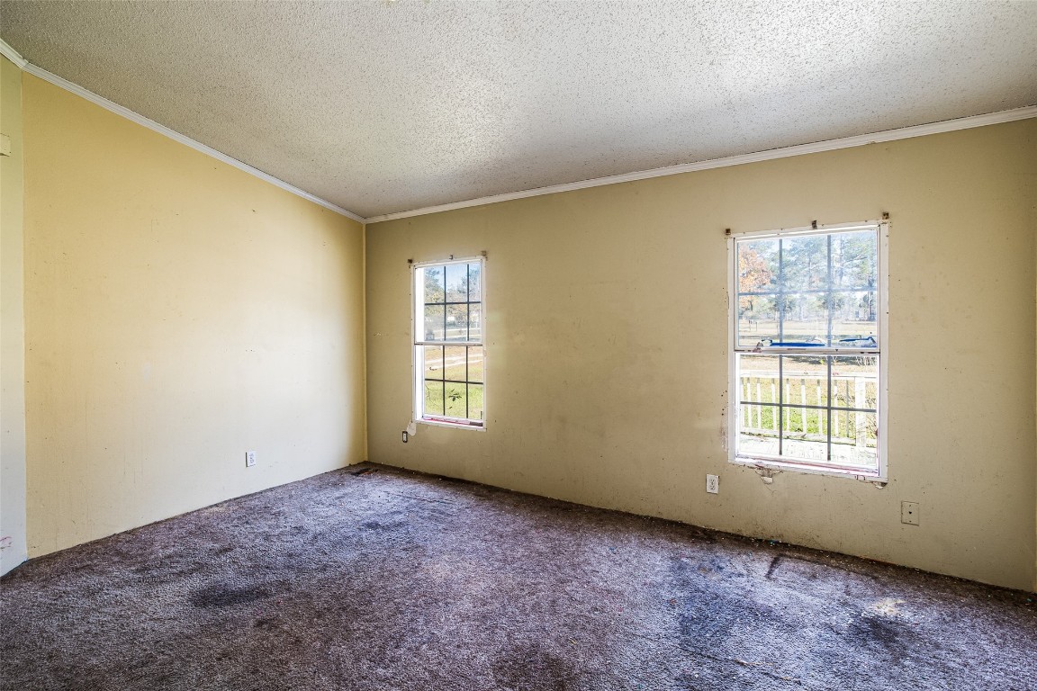 18044 Geranium Lane Hilliard, FL 32046 - Photo 5 of 15 a view of an empty room with a window