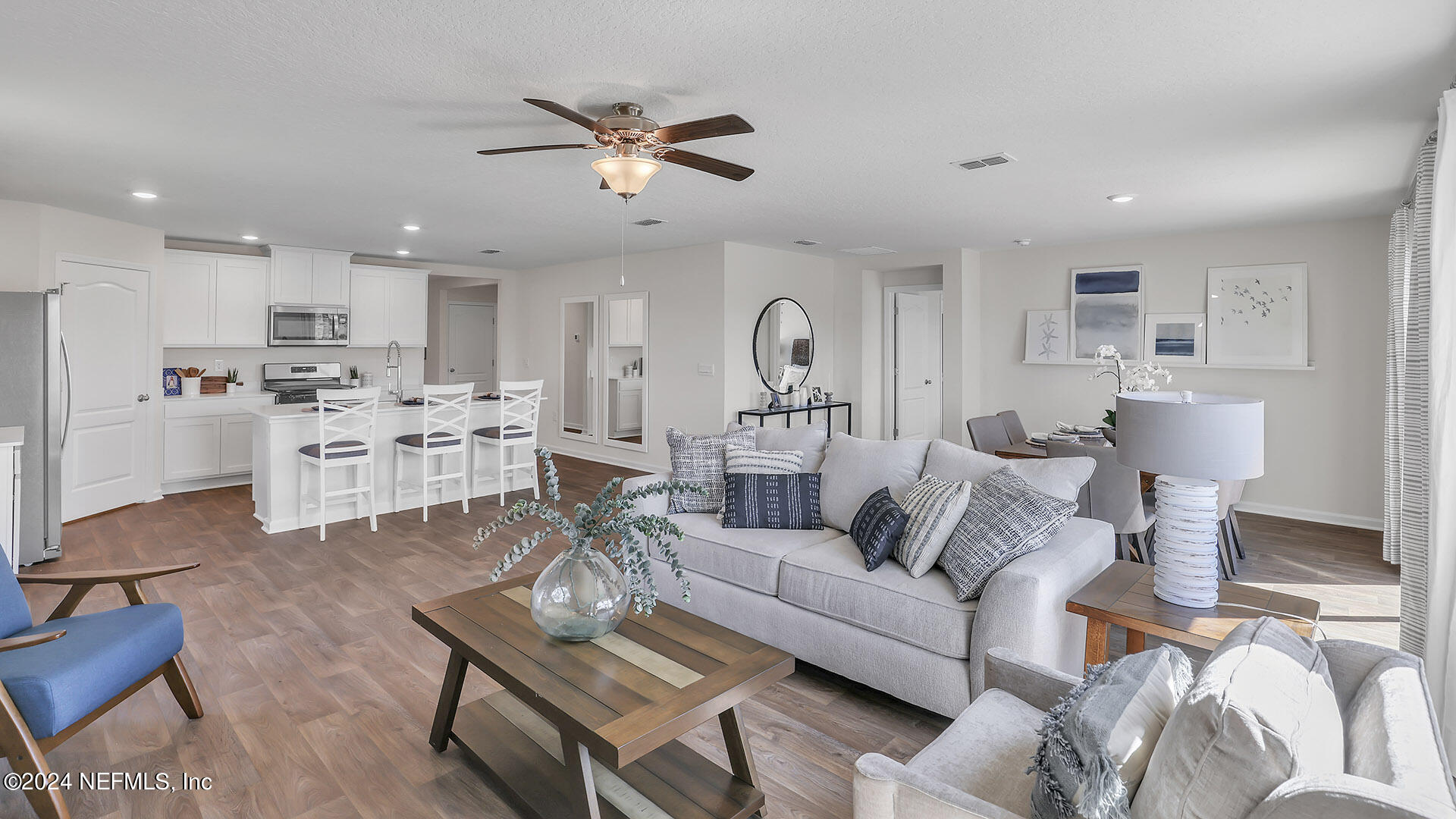 114 Hulett Wds Road Palm Coast, FL 32137 - Photo 12 of 36 a living room with furniture and kitchen view