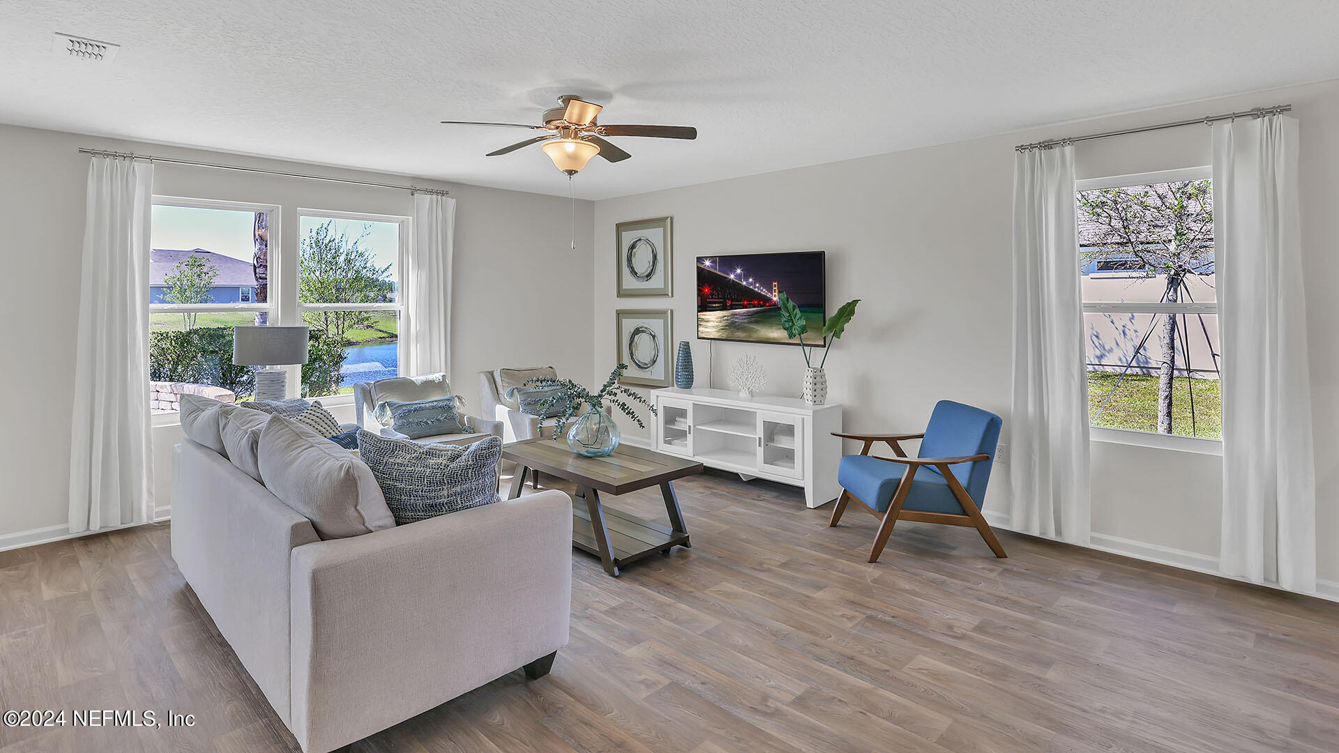 114 Hulett Wds Road Palm Coast, FL 32137 - Photo 13 of 36 a living room with furniture and a window