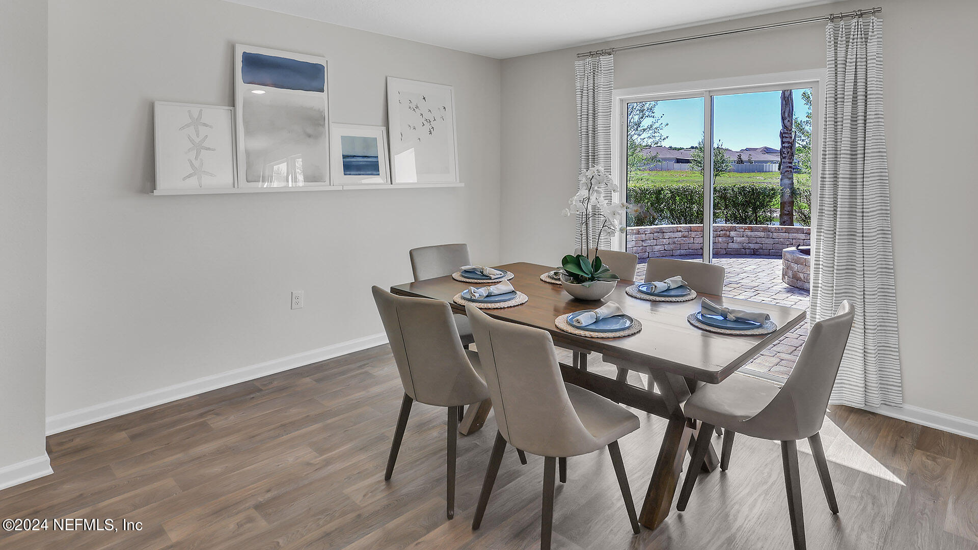 114 Hulett Wds Road Palm Coast, FL 32137 - Photo 14 of 36 a dining room with furniture and window