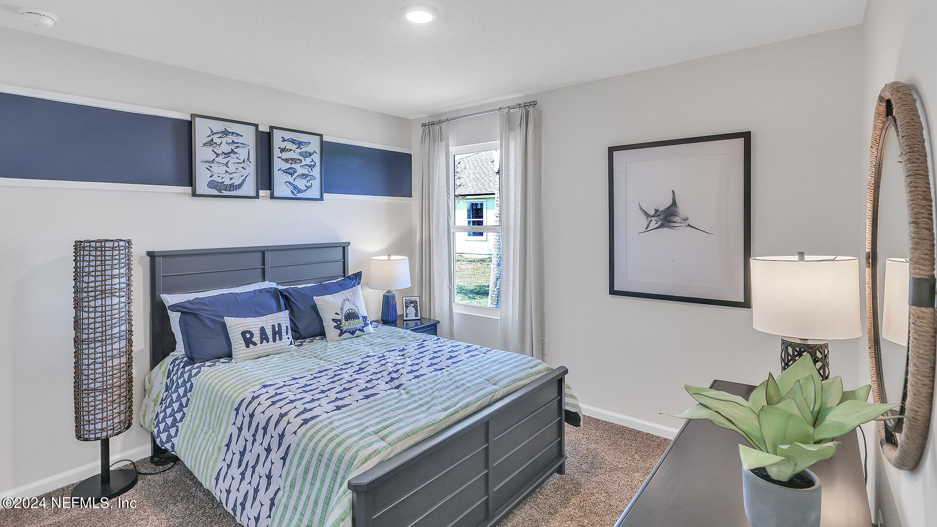 114 Hulett Wds Road Palm Coast, FL 32137 - Photo 22 of 36 a bedroom with a bed potted plant and a painting on the wall