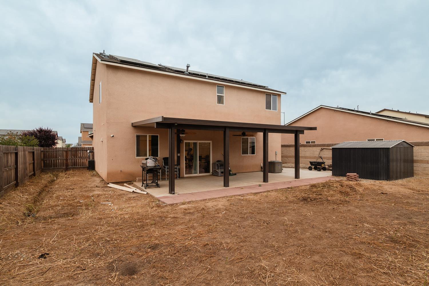 1945 East Gum Avenue Reedley, CA 93654 - Photo 6 of 31 a view of a house with patio