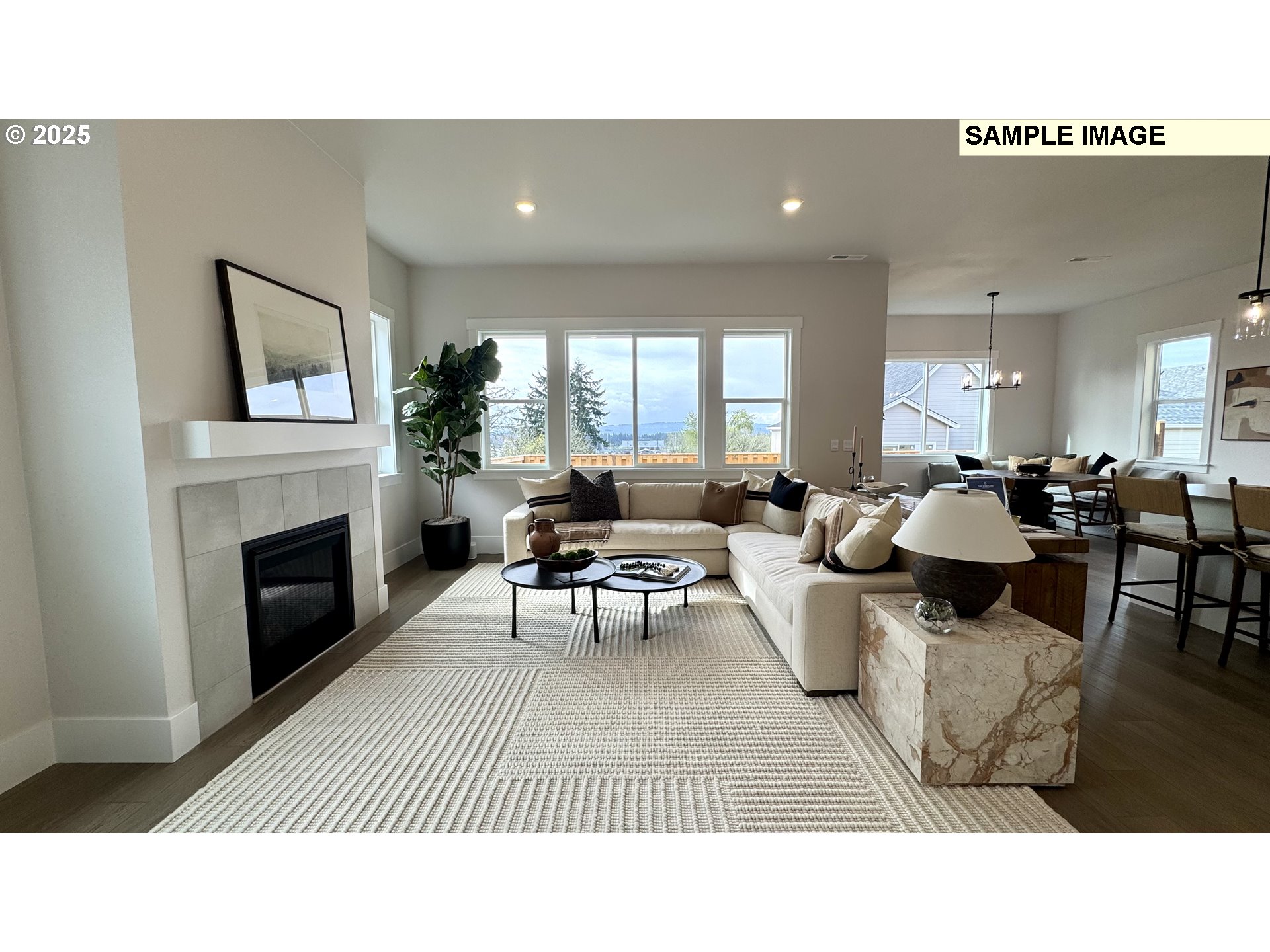 17714 Southwest Watchman Lane Beaverton, OR 97007 - Photo 14 of 22 a living room with furniture a window and a fireplace