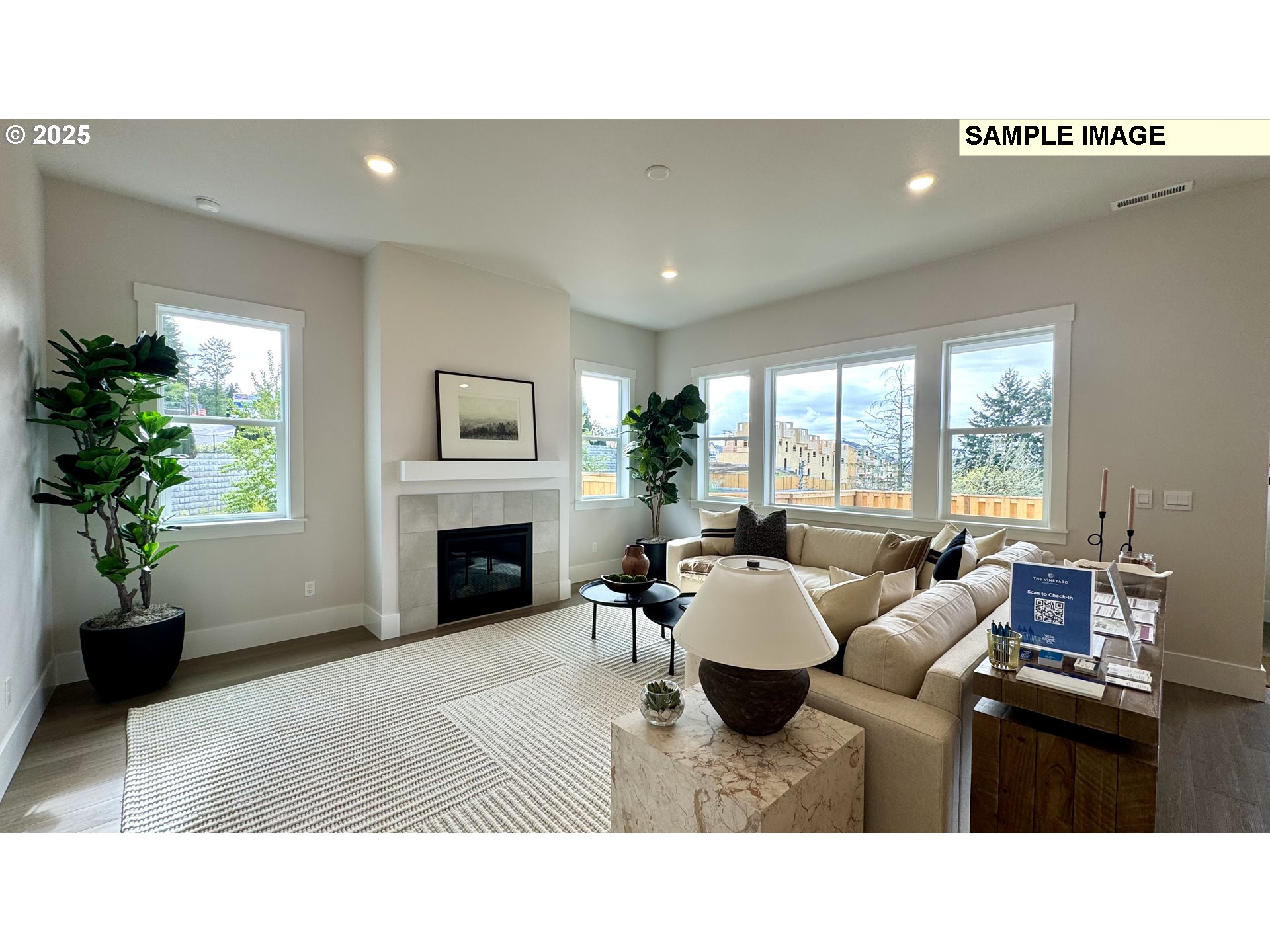 17714 Southwest Watchman Lane Beaverton, OR 97007 - Photo 15 of 22 a living room with furniture a window and a fireplace