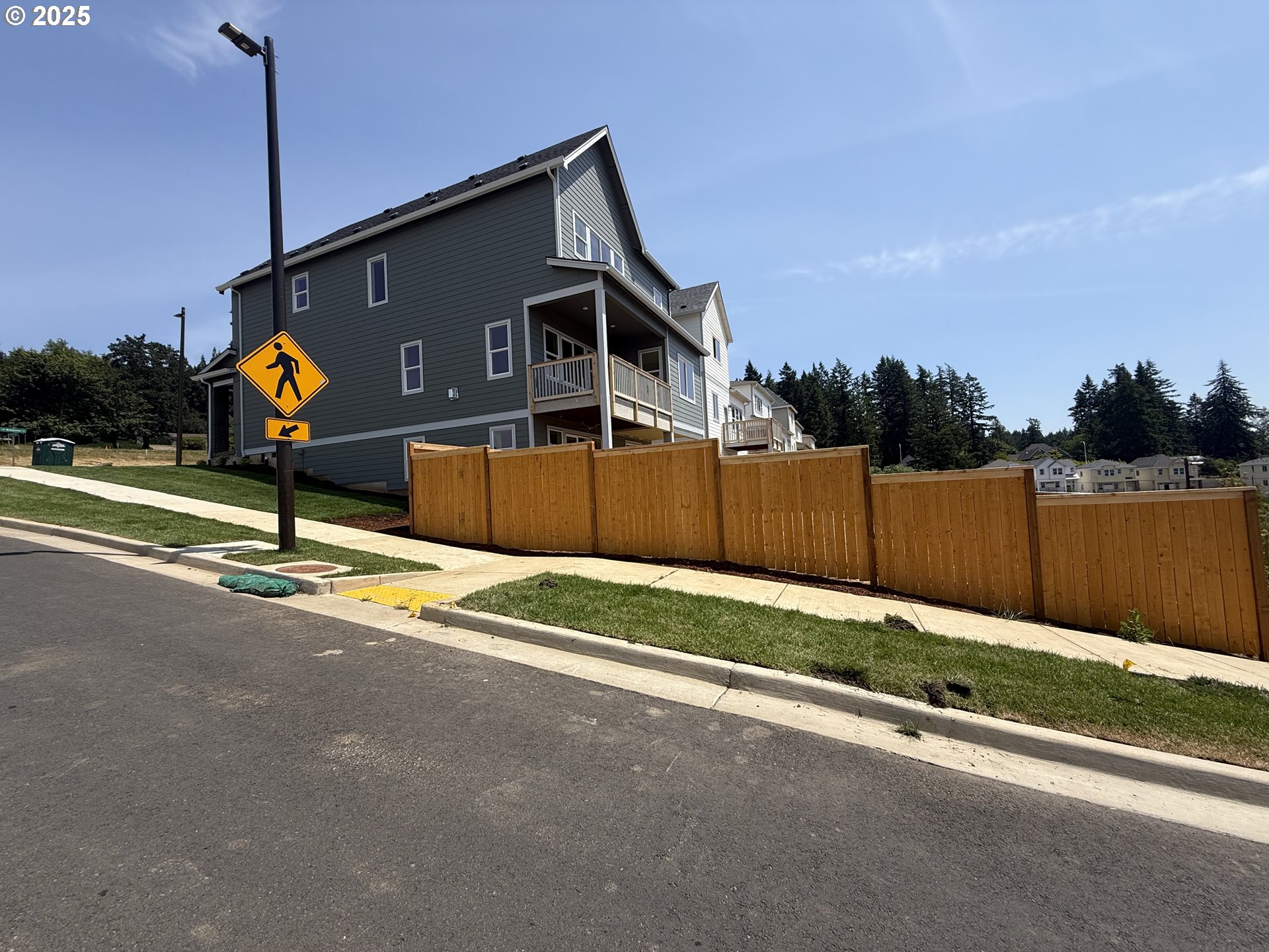 17714 Southwest Watchman Lane Beaverton, OR 97007 - Photo 5 of 22 a house view with a street