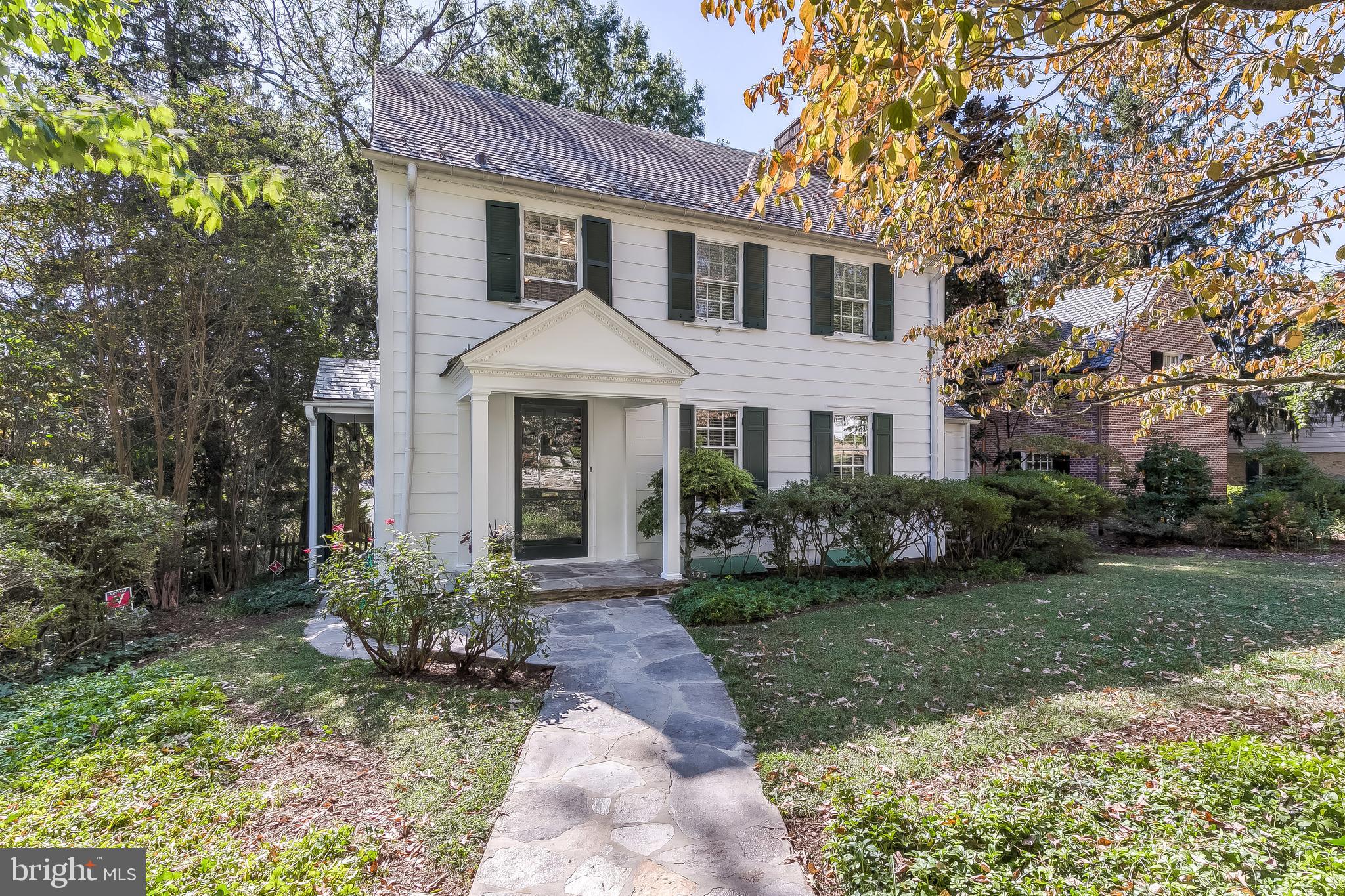 325 Tunbridge Road Baltimore, MD 21212 - Photo 1 of 38 a front view of a house with garden