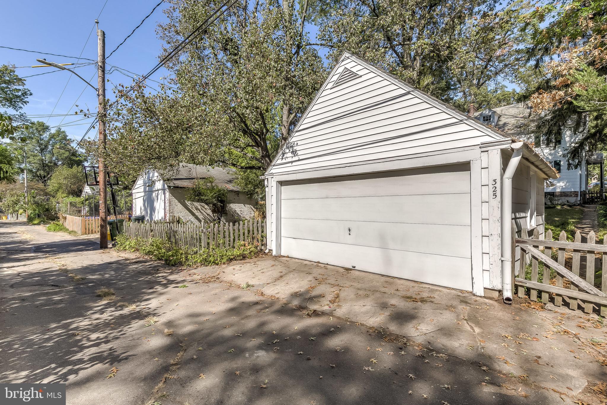 325 Tunbridge Road Baltimore, MD 21212 - Photo 38 of 38 a view of a house with a yard and garage