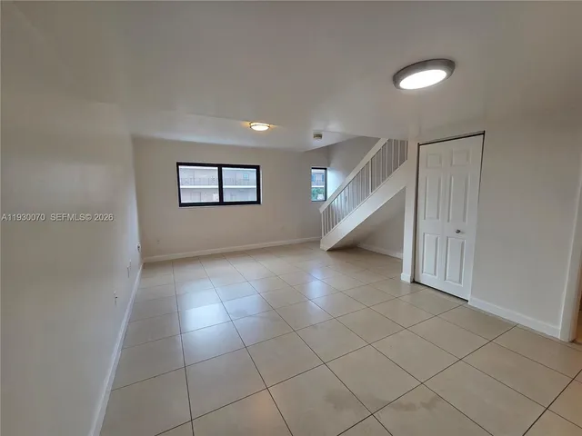 a view of an entryway with stairs