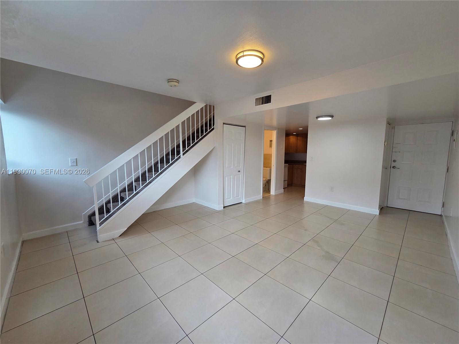 5 Olive Drive, Unit 24 Hialeah, FL 33010 - Photo 3 of 16 a view of an entryway with stairs