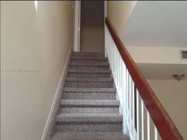 a view of a closet area with window