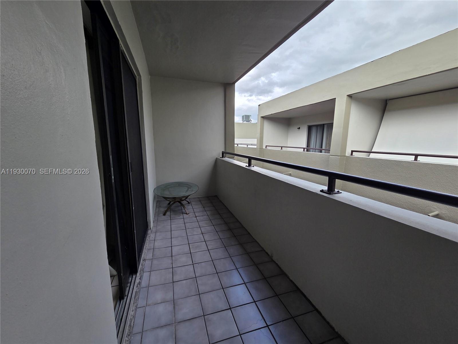 5 Olive Drive, Unit 24 Hialeah, FL 33010 - Photo 9 of 16 a kitchen with a sink and cabinets
