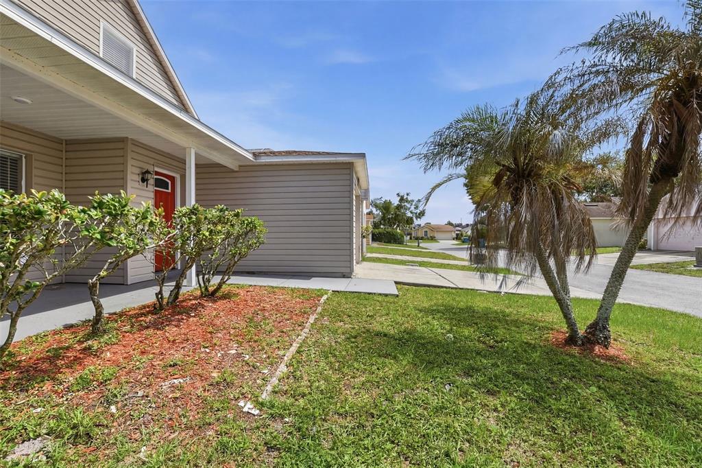 617 Greys Ferry Road Orlando, FL 32811 - Photo 2 of 35 a view of a house with backyard and sitting area