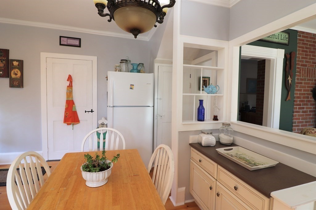 751 Snipatuit Road Rochester, MA 02770 - Photo 15 of 42 a kitchen with stainless steel appliances granite countertop a sink and a refrigerator