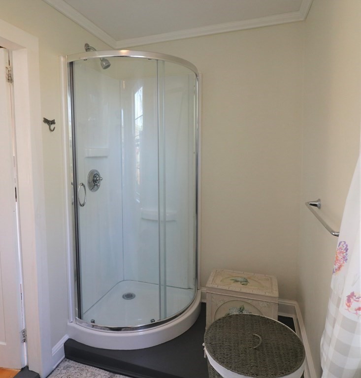751 Snipatuit Road Rochester, MA 02770 - Photo 18 of 42 a bathroom with a shower a toilet and a sink