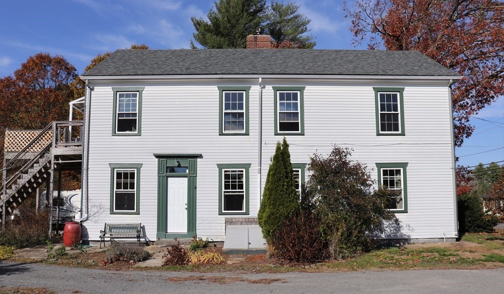751 Snipatuit Road Rochester, MA 02770 - Photo 4 of 42 a front view of house with street