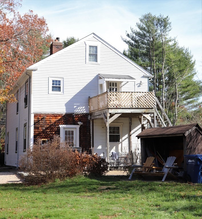 751 Snipatuit Road Rochester, MA 02770 - Photo 5 of 42 a front view of a house with garden