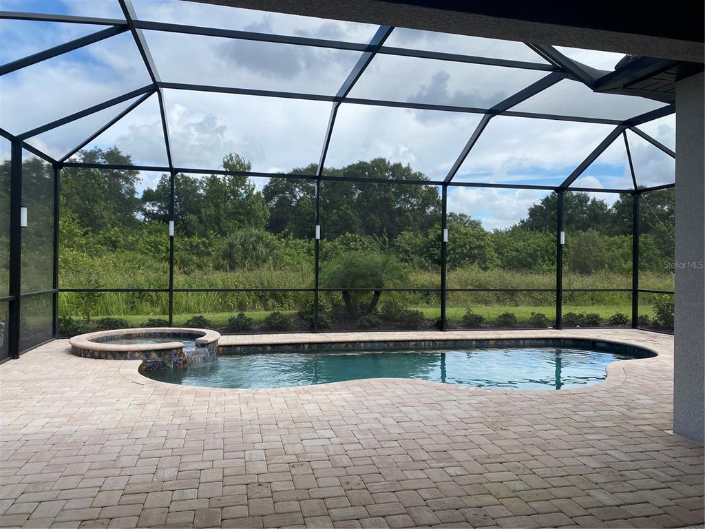 17525 Hickok Belt Loop Bradenton, FL 34211 - Photo 25 of 31 a view of outdoor space with swimming pool