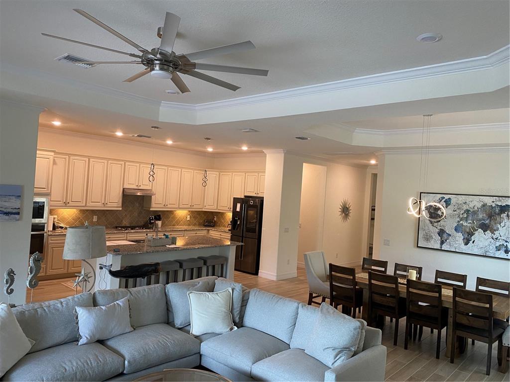 17525 Hickok Belt Loop Bradenton, FL 34211 - Photo 9 of 31 a view of a dining room with furniture