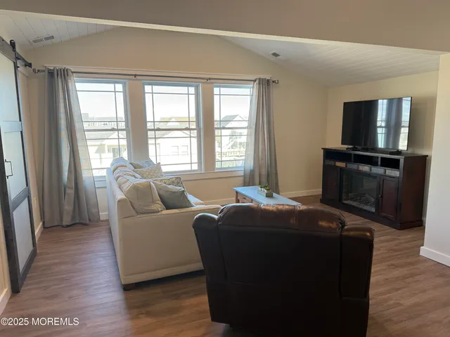 a bedroom with a bed and a closet