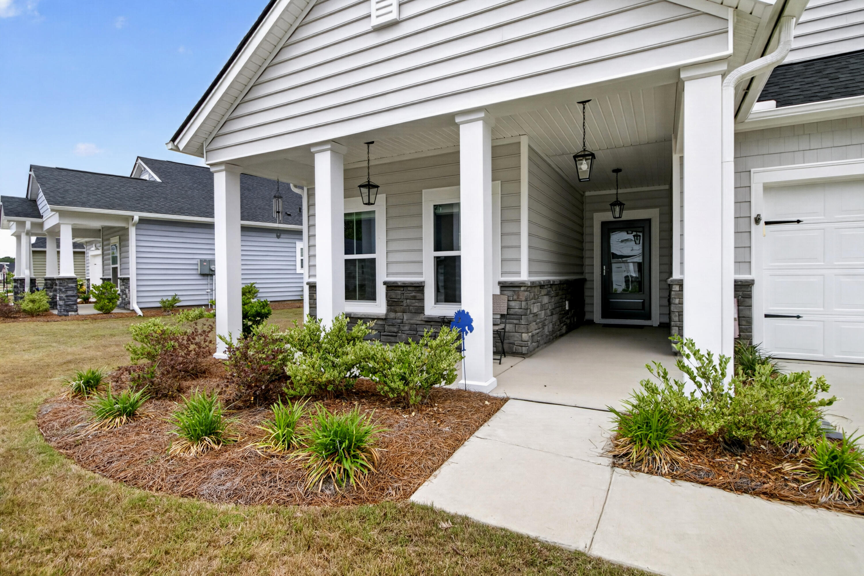 1387 Locals Street Ridgeville, SC 29472 - Photo 4 of 28 1387 Locals front porch