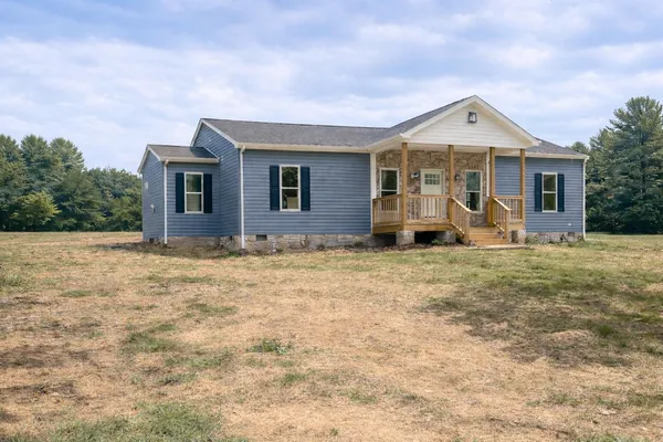 a front view of house with yard