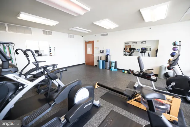 a view of a hallway with a white walls