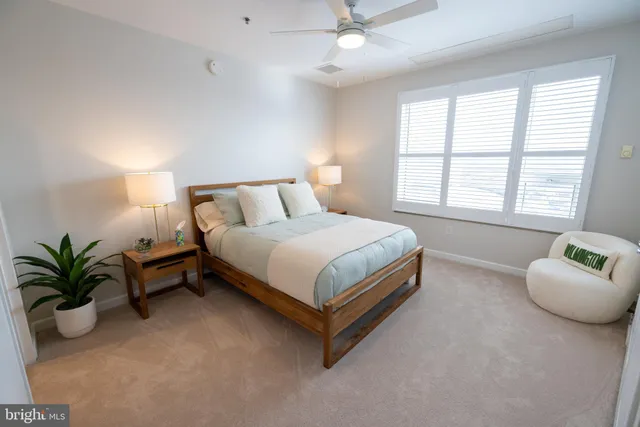 a bedroom with a bed and furniture