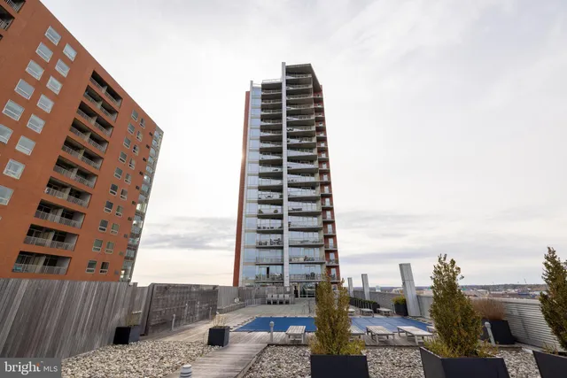 a bedroom with a bed chair and a couch