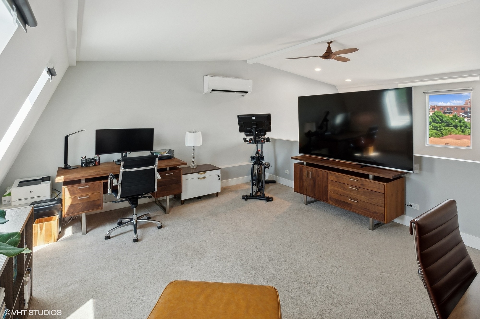 4438 North Racine Avenue, Unit B Chicago, IL 60640 - Photo 22 of 26 a living room with furniture and a flat screen tv