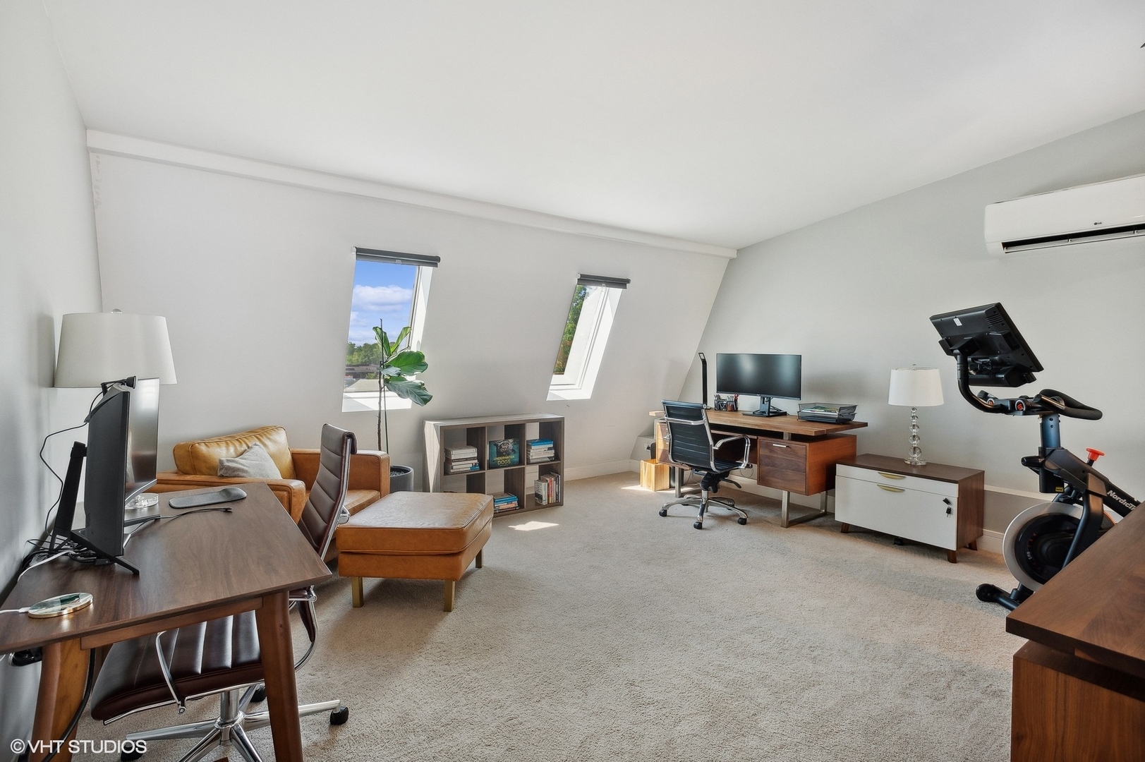 4438 North Racine Avenue, Unit B Chicago, IL 60640 - Photo 23 of 26 a living room with furniture and a flat screen tv