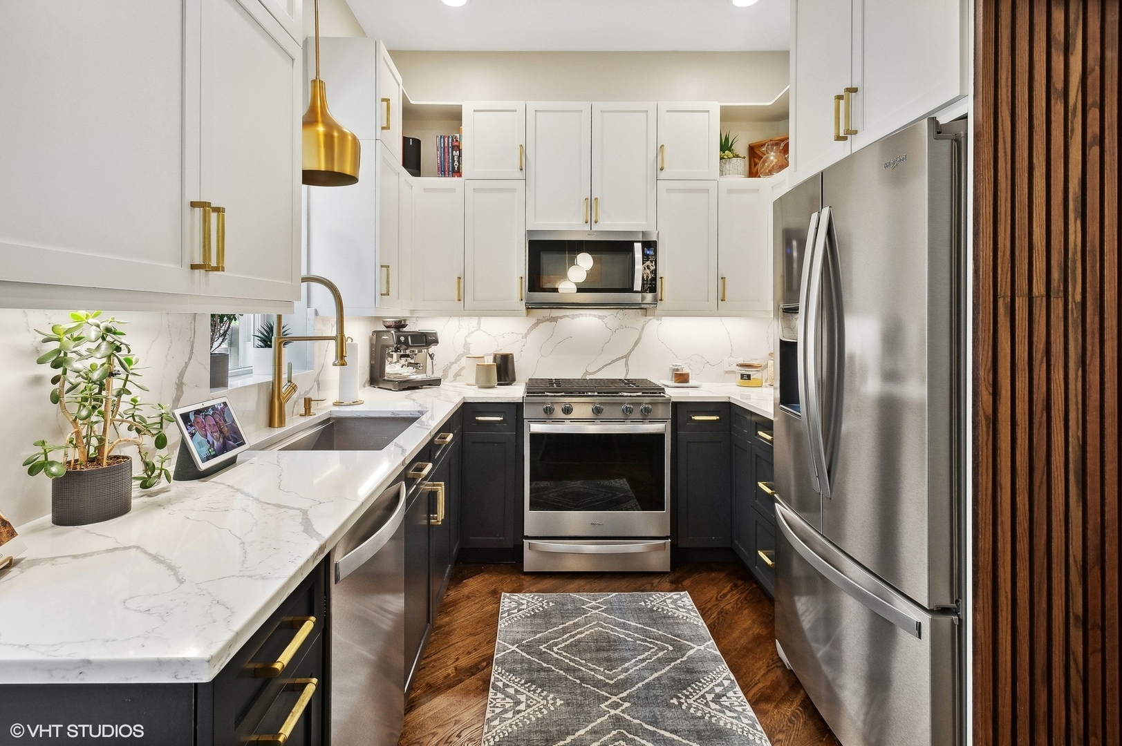 4438 North Racine Avenue, Unit B Chicago, IL 60640 - Photo 9 of 26 a kitchen with granite countertop a refrigerator stove and sink