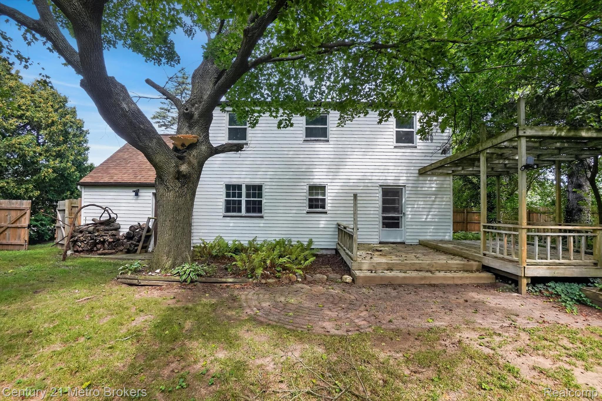 4575 Brockway Road Saginaw, MI 48638 - Photo 39 of 44 Charming white clapboard Colonial with mature shade trees anchoring the property